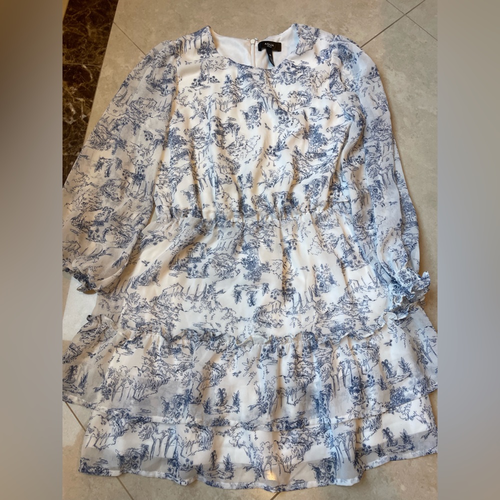 White,m and navy blue pattern dress